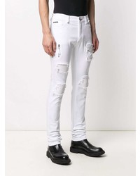 Мужские белые рваные зауженные джинсы от Philipp Plein