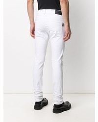 Мужские белые рваные зауженные джинсы от Philipp Plein