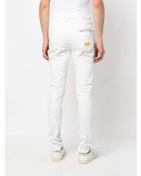 Мужские белые рваные зауженные джинсы от purple brand