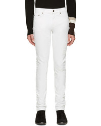 Мужские белые рваные зауженные джинсы от Saint Laurent