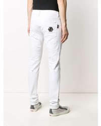 Мужские белые рваные зауженные джинсы от Philipp Plein