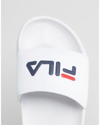 Белые сандалии на плоской подошве от Fila