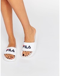 Белые сандалии на плоской подошве от Fila