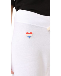 Женские белые спортивные штаны в горизонтальную полоску от Sundry