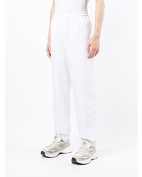 Мужские белые спортивные штаны от Lacoste