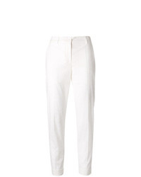 Белые узкие брюки с вышивкой