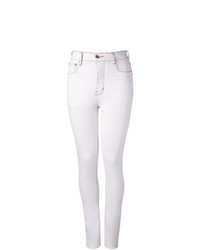 Белые узкие брюки от Amapô