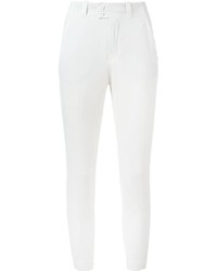 Белые узкие брюки от Dondup