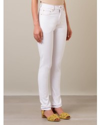 Белые узкие брюки от Amapô