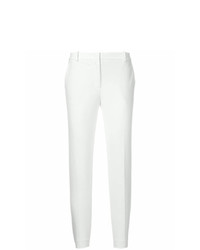 Белые узкие брюки от Kiltie