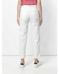Белые узкие брюки от Moncler