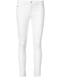 Белые хлопковые рваные джинсы скинни от AG Jeans