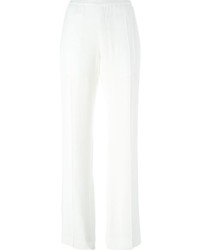 Белые шелковые широкие брюки от Haider Ackermann