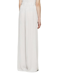 Белые широкие брюки от Raquel Allegra