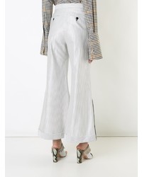 Белые широкие брюки от Irene