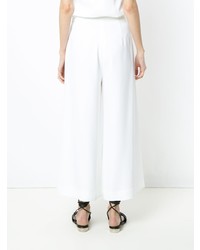 Белые широкие брюки от Andrea Marques