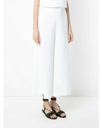 Белые широкие брюки от Andrea Marques