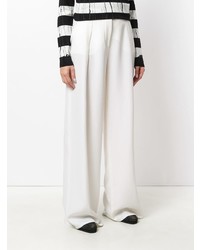 Белые широкие брюки от Tomas Maier