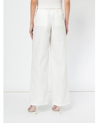 Белые широкие брюки от Aalto