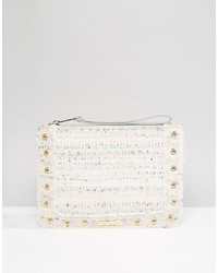 Белый клатч из плотной ткани с украшением от Juicy Couture