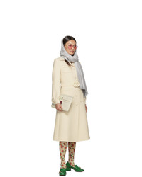 Белый кожаный клатч в вертикальную полоску от Gucci