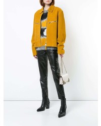 Белый кожаный клатч с украшением от Coach