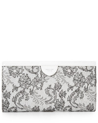Белый кожаный клатч от Rochas