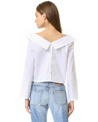 Белый топ с открытыми плечами от Opening Ceremony