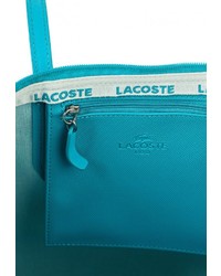 Бирюзовая кожаная большая сумка от Lacoste