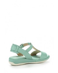 Бирюзовые кожаные босоножки на танкетке от Caprice