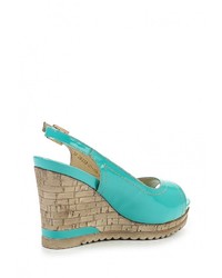 Бирюзовые кожаные босоножки на танкетке от Спартак