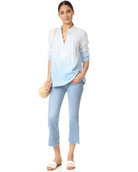 Голубая блузка от Raquel Allegra