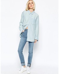 Женская голубая джинсовая рубашка от Weekday