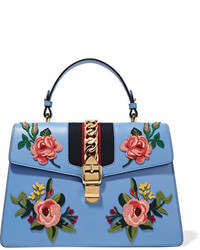 Голубая кожаная большая сумка с украшением от Gucci