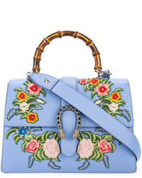 Женская голубая кожаная сумка с вышивкой от Gucci