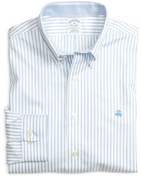 Голубая рубашка с длинным рукавом в вертикальную полоску