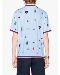 Мужская голубая рубашка с коротким рукавом с цветочным принтом от Gucci
