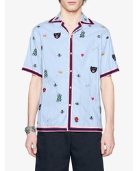 Мужская голубая рубашка с коротким рукавом с цветочным принтом от Gucci