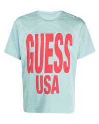Мужская голубая футболка с круглым вырезом с принтом от GUESS USA