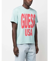 Мужская голубая футболка с круглым вырезом с принтом от GUESS USA