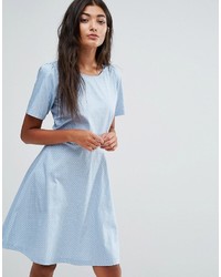 Голубое платье с плиссированной юбкой в горошек