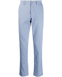 Голубые брюки чинос от Lacoste