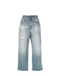 Голубые джинсовые рваные широкие брюки