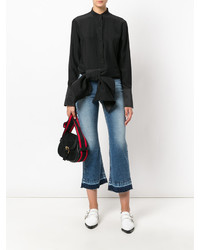 Голубые джинсы-клеш от CK Calvin Klein