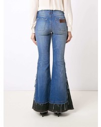 Голубые джинсы-клеш от Amapô