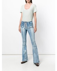 Голубые джинсы-клеш от Unravel Project