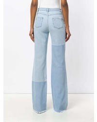 Голубые джинсы-клеш от Philipp Plein