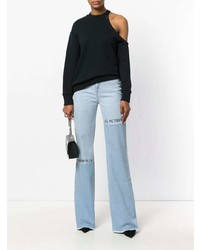 Голубые джинсы-клеш от Philipp Plein