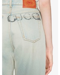 Женские голубые джинсы с принтом от Gucci