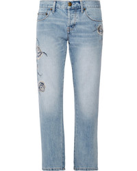 Голубые джинсы с цветочным принтом
